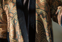 Load image into Gallery viewer, Close up photo of front opening. Front outer facing is black velvet and quilted using trapunto stitching.