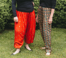 Load image into Gallery viewer, Two women standing side by. Photo from waist down. Woman on left is wearing 119 Sarouelles (View A Turkish Pants). Woman on right is wearing view C (Indian pants).