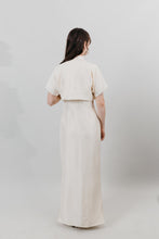 Load image into Gallery viewer, Woman wearing a white cheongsam - back view with white background.