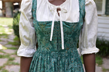Load image into Gallery viewer, Close up photo of the bodice and waist gatherings of View B Dirndl. Model is wearing View A blouse with tie closure at neckline.