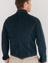 Load image into Gallery viewer, Back of man's denim chef's jacket.