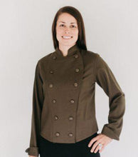 Load image into Gallery viewer, Woman wearing a brown Chef's Coat in front of white back ground.