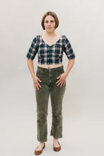 Load image into Gallery viewer, Photo of front view of Indian Choli top. Model wears pants and stands in front of white backdrop.