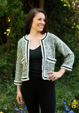 Load image into Gallery viewer, Model wearing open front adaptaion of Burmese Jacket. Jacket has two of three pockets and no front closures.