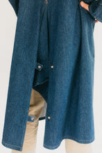 Load image into Gallery viewer, Close up of the bottom back fantail of a dark blue Drover's Coat.