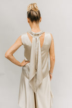 Load image into Gallery viewer, Back view of woman with hand on her hip wearing 237 Tango dress with twp triangular shaped streamers.
