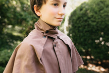 Load image into Gallery viewer, Close up of boy wearing brown Drovers coat with capelet.