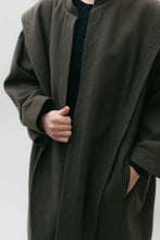 Load image into Gallery viewer, Close up of the dark olive green szur front. The panels and cuffs are quilted.