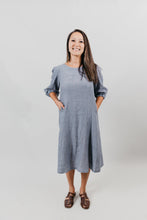 Load image into Gallery viewer, Grey linen muumuu on an Asian American woman standing in front of a white backdrop.
