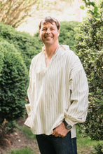 Load image into Gallery viewer, Smiling man, standing with hands in pockets,surrounded by greenery, wearing 204 Missouri River Boatman's Shirt