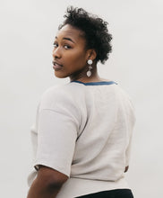 Load image into Gallery viewer, Back view of African american women looking over her shoulder wearing the 211 Two middies.