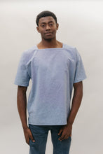 Load image into Gallery viewer, Young African American man standing in front of a white studio backdrop wearing the square neck 211 Two Middies.