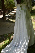 Load image into Gallery viewer, Close up back view of woman wearing 227 Edwardian Bridal Gown and Dress trail of the full sweep of skirt.