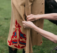 Load image into Gallery viewer, Close up view of a woman buttoning the buttons of another woman wearing the 231 Big Sky Riding Skirt.