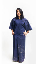 Load image into Gallery viewer, Asian American woman wearing a navy embroidered kimono standing in front of a white background.