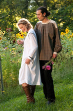 Load image into Gallery viewer, Young white man and woman standing surrounded by greenery, standing in front of sunflower wearing 148 Black Forest Smock