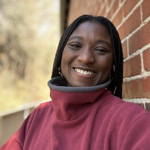 Load image into Gallery viewer, Close up of Black woman wearing a red mock fleece sweater smiling