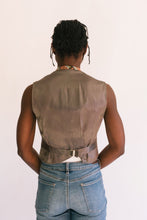 Load image into Gallery viewer, Back view of African woman standing in front of a white studio backdrop wearing View A 222 Vintage Vests, with adjustable back waist belt.