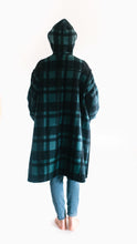 Load image into Gallery viewer, photo of back view of Siberian Parka on model. she wears the hood up and shows shoulder yoke details