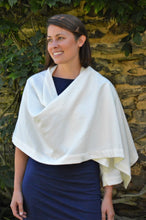 Load image into Gallery viewer, brunette white woman smiling wearing a navy blue dressed wrapped in the #271 Sunset Wrap