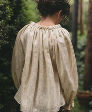 Load image into Gallery viewer, Back view of Romanian Blouse on a woman outside
