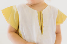 Load image into Gallery viewer, Close up photo of Turkish Tunic.  Photo showes stitching around the neckline and front opening.

