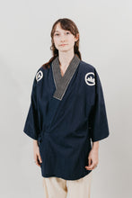 Load image into Gallery viewer, Japanese American woman in a navy Hippari and cream pants in front of white background.

