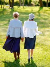 Load image into Gallery viewer, Back view of two women surrounded by greenery wearing the Metro Middy Blouse
