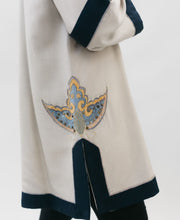 Load image into Gallery viewer, Photo of side vent and embellishment on lower side of view C
