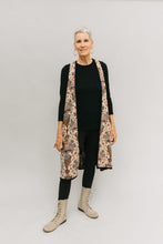 Load image into Gallery viewer, Front view Long Greek vest.  Woman is wearing vest open in front and stands in front of a white backdrop.
