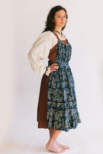 Load image into Gallery viewer, Model wearing Russian settlers outfit.  Blouse is worn under jumper and apron is worn over the jumper.
