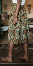Load image into Gallery viewer, Mid calf version of chupa inspired wrap skirt.  Shows wrapping side extensions.
