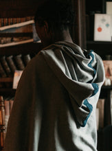 Load image into Gallery viewer, Photo of back view of hood with lace trim.
