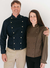 Load image into Gallery viewer, Man and woman standing together wearing a navy and brown Belgian Military Chef's Coats, respectively.  White backdrop.
