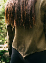 Load image into Gallery viewer, Close up of bottom of back of the chef's jacket.
