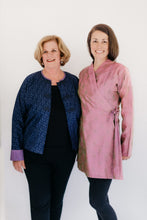 Load image into Gallery viewer, Two women modeling the Burmese Jacket (on left) and the Thai Blouse (right).  Burmese Jacket is unbuttoned in front and Thai Jacket is a lengthened adaptation.
