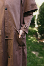 Load image into Gallery viewer, Close up of hand in pocket of brown Drover's Coat.
