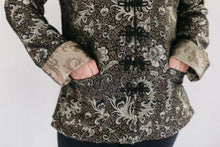 Load image into Gallery viewer, close up of hands in pockets of the Chinese pajama jacket with loop frog closures.
