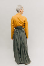 Load image into Gallery viewer, Photo of back view of the Hakama pants on model.
