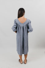 Load image into Gallery viewer, Back view of woman wearing a grey linen muumuu with 3/4 length sleeves.  Background is white backdrop.
