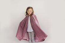 Load image into Gallery viewer, Smiling small girl standing in front of a white studio backdrop wearing 208 Kinsale Cloak for Young Maidens arms extended to either side to display the voluminous cloak.
