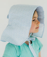 Load image into Gallery viewer, little girl turned to the right wearing the 213 Sunbonnet
