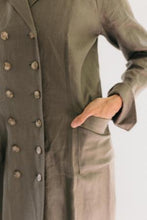 Load image into Gallery viewer, Close up of woman wearing 230 Model T Duster with hand in her pocket, and showing double button rows.
