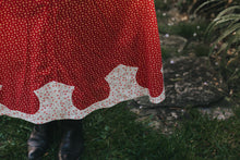 Load image into Gallery viewer, Close up of the bottom of 243 Rodeo Cowgirl Skirt shaped hem applique.
