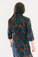 Load image into Gallery viewer, Back view of woman standing in front of a white studio backdrop wearing 247 Lindy Shirtdress
