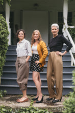Load image into Gallery viewer, Three women, two young women and an older woman wearing the 250 Hollywood pants, one wearing knickers, trousers and shorts
