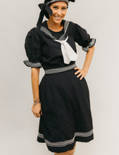 Load image into Gallery viewer, A white woman with her hand on her hip wearing 253 Vintage Bathing Costume with the jaunty cap.
