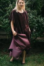 Load image into Gallery viewer, Young blonde White woman surrounded by greenery, wearing the Monte Carlo Dress with V-Neck Tunic on top.

