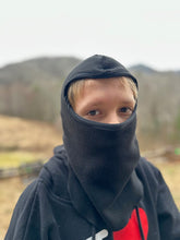 Load image into Gallery viewer, Boy wearing a black fleece balaclava outside
