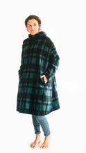 Load image into Gallery viewer, Photo of young woman wearing parka.  Model is slightly turned to show pocket set into front panel seam.
